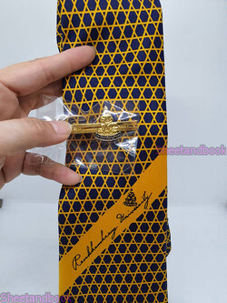 เครื่องแบบ เนคไท ม.รามคำแหง รับปริญญา (เนคไทลายชะลอมแบบสำเร็จพร้อมตัวหนีบสีทอง+ดำลายพ่อขุนฯ) DR0026 sheetandbook