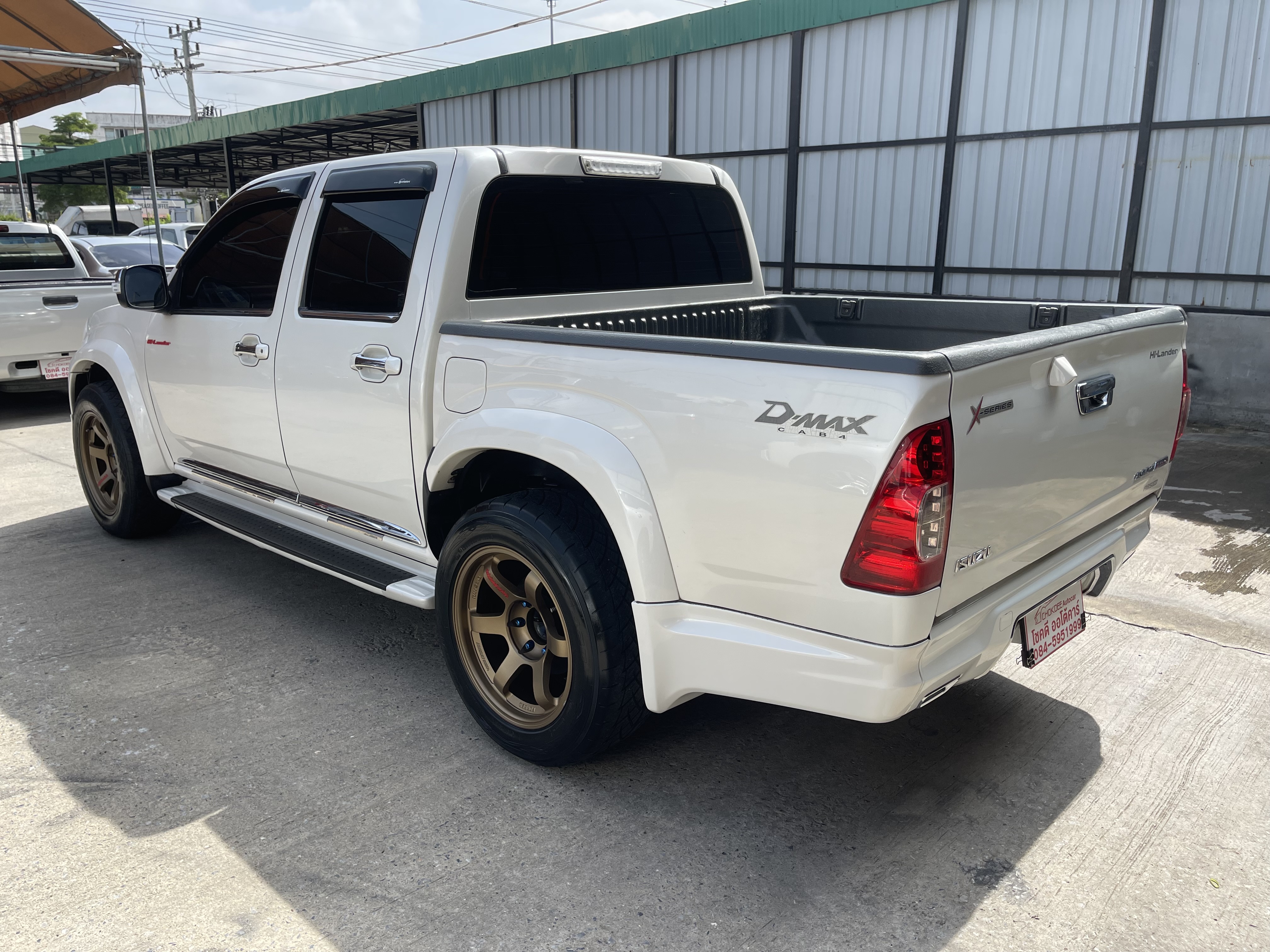 Isuzu Dmax 4ประตู Hilander 2.5 Abs X-Series Navi 2011 ขาวมุก