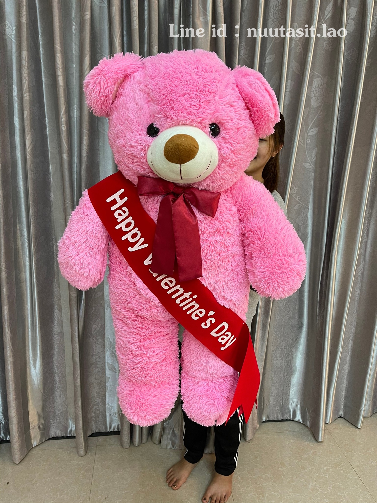 ตุ๊กตาหมีมีโบว์ตัวใหญ่