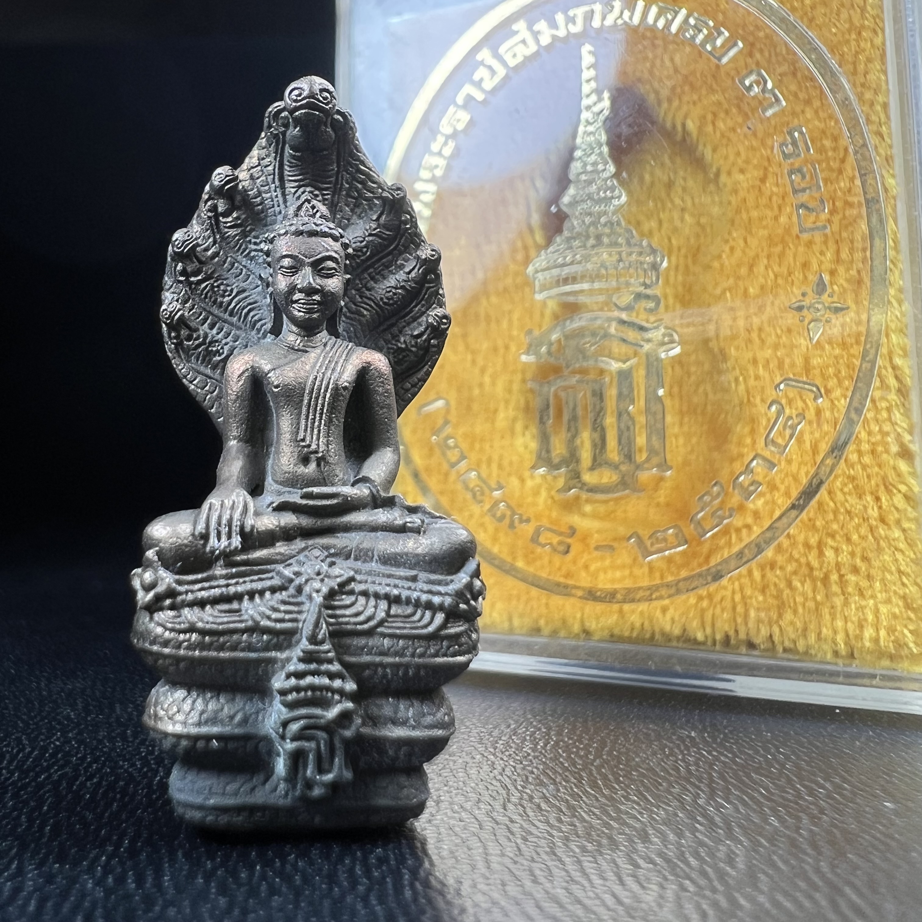 พระพุทธรูปนาคปรกปางมารวิชัย สธ. เนื่องวโรกาสสมเด็จพระเทพรัตนราชสุดาฯทรงเจริญพระชนมายุครบ 3รอบ ปี2534 พระกริ่งนวโลหะ พิธีพุทธาภิเษก ณ วัดบวรนิเวศวิหาร โดยมีสมเด็จพระญาณสังวรสมเด็จพระสังฆราชเป็นองค์ประธาน(พิธีใหญ่ มวลสารดี พุทธศิลป์งดงาม)อุดมวลสารผงจิตรลดา