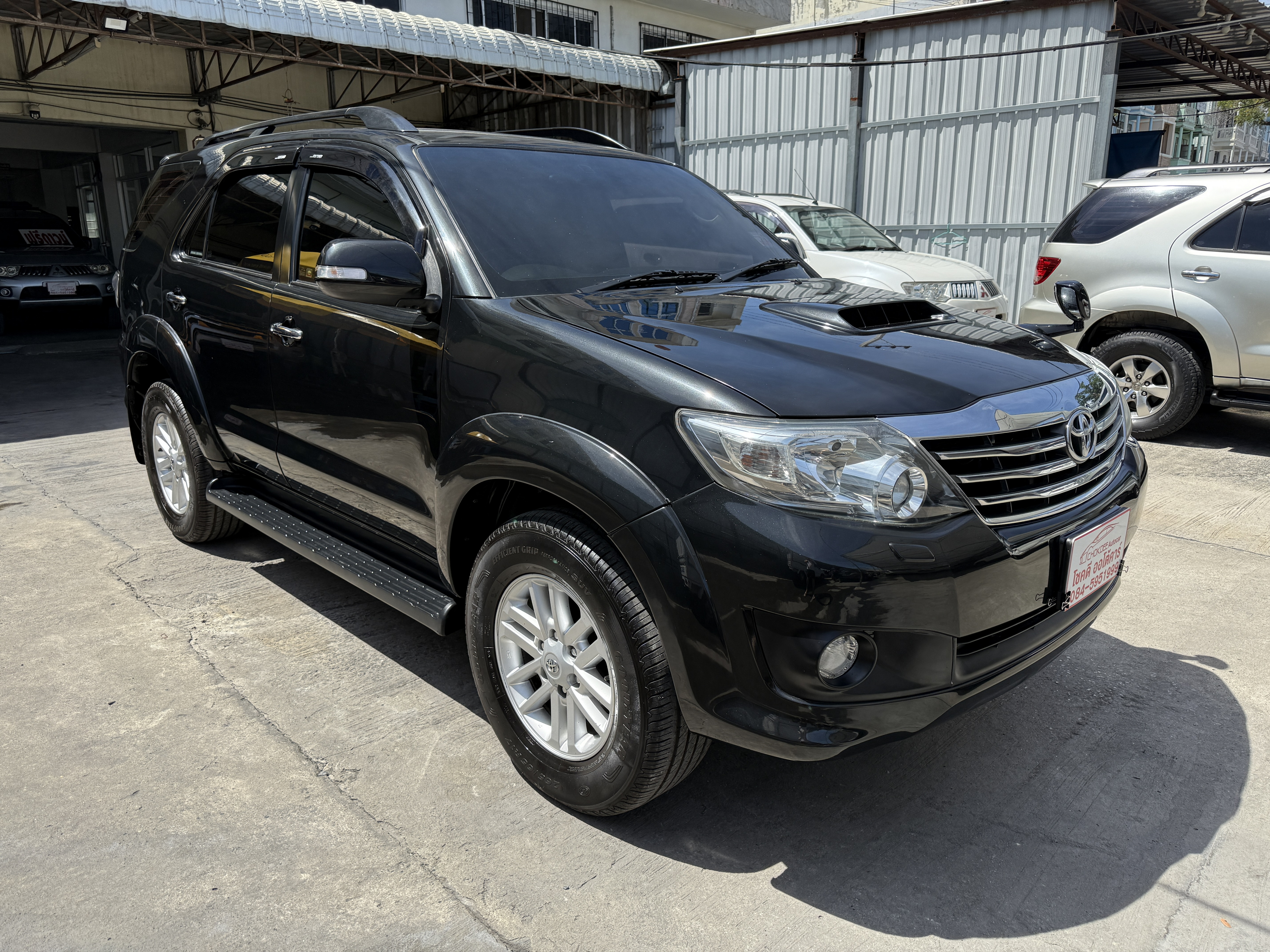 Toyota Fortuner Champ 3.0 V Navi 4WD At ปี 2013 ดำ