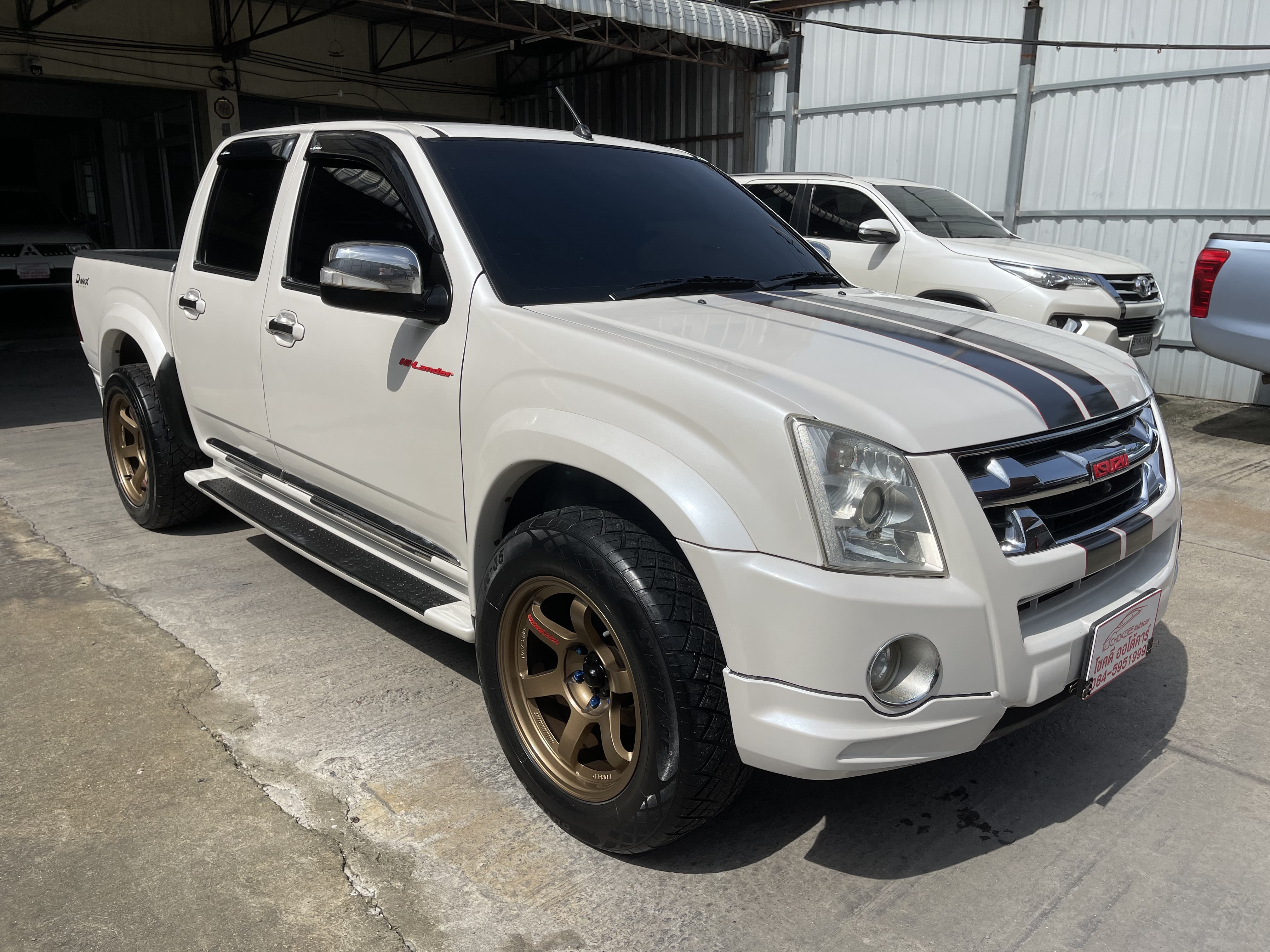 Isuzu Dmax 4ประตู Hilander 2.5 Abs X-Series Navi 2011 ขาวมุก