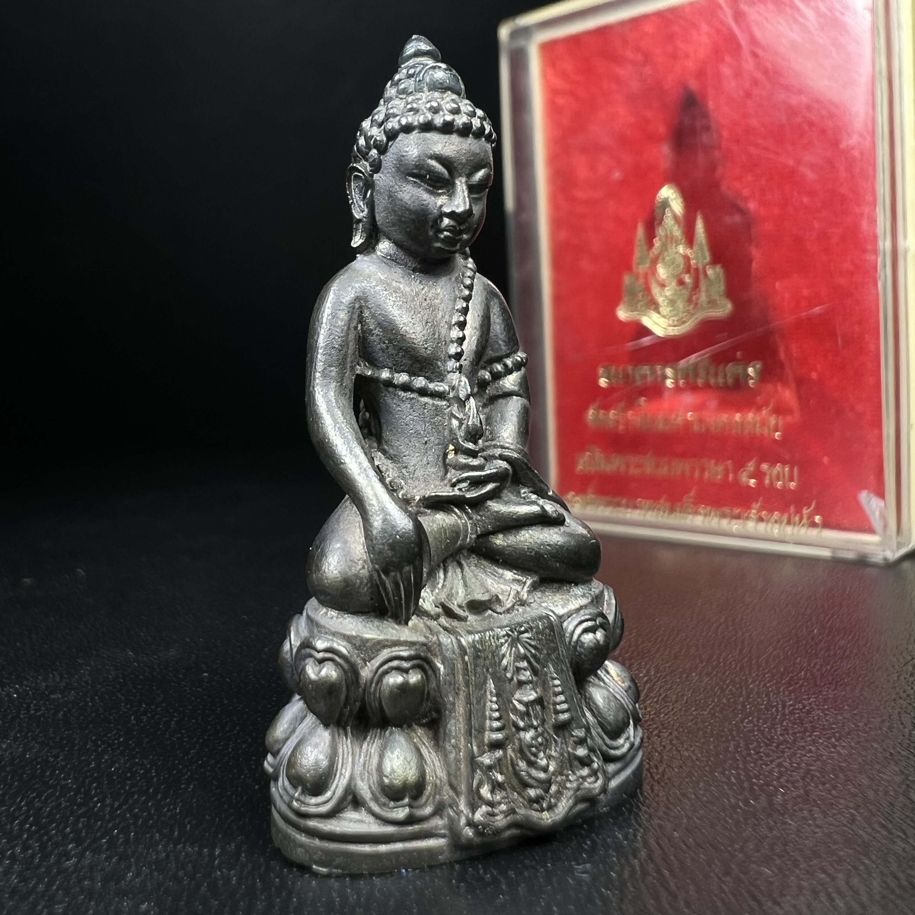 พระกริ่งปรมาภรณ์พุทธปัญญา(พระกริ่งศรีนคร 2) จัดสร้างเนื่องในมหามงคลสมัยเฉลิมพระชมน์พรรษา 5 รอบ องค์พระบาทสมเด็จพระเจ้าอยู่หัวรัชกาลที่9 ปี 2530 เนื้อนวโลหะ (ออกแบบโดยนายช่างเกษม มงคลเจริญ มีพระอาจารย์ไสว วัดราชนัดดา กรุงเทพ เป็นเจ้าพิธีครั้งสุดท้าย)