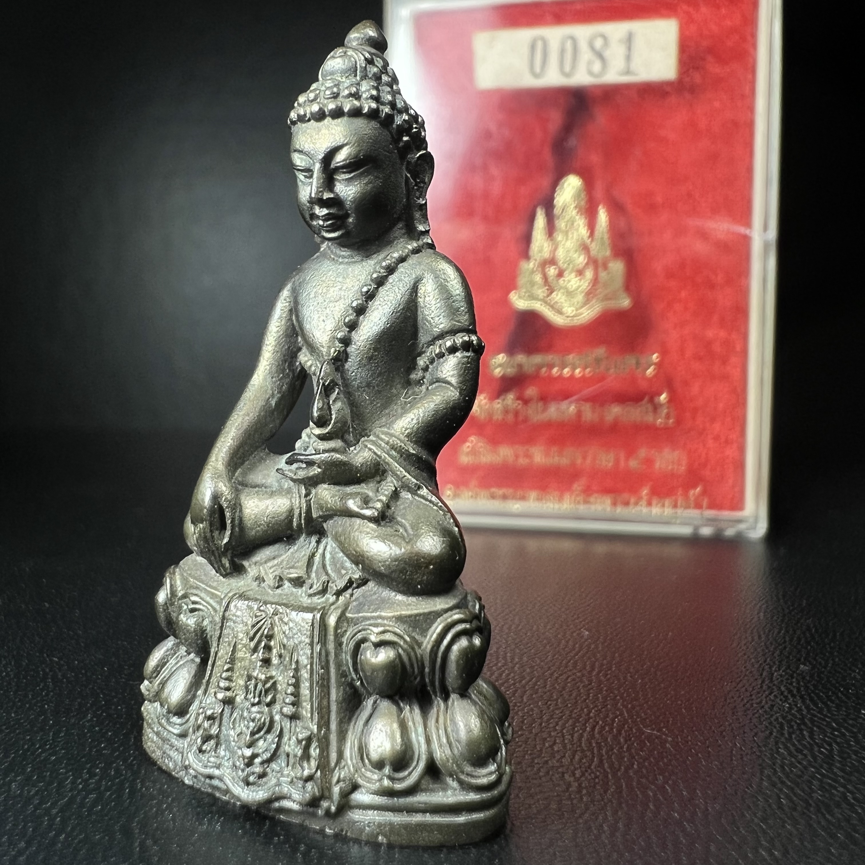 พระกริ่งปรมาภรณ์พุทธปัญญา(พระกริ่งศรีนคร 2) จัดสร้างเนื่องในมหามงคลสมัยเฉลิมพระชมน์พรรษา 5 รอบ องค์พระบาทสมเด็จพระเจ้าอยู่หัวรัชกาลที่9 ปี 2530 เนื้อนวโลหะ (ออกแบบโดยนายช่างเกษม มงคลเจริญ มีพระอาจารย์ไสว วัดราชนัดดา กรุงเทพ เป็นเจ้าพิธีครั้งสุดท้าย)