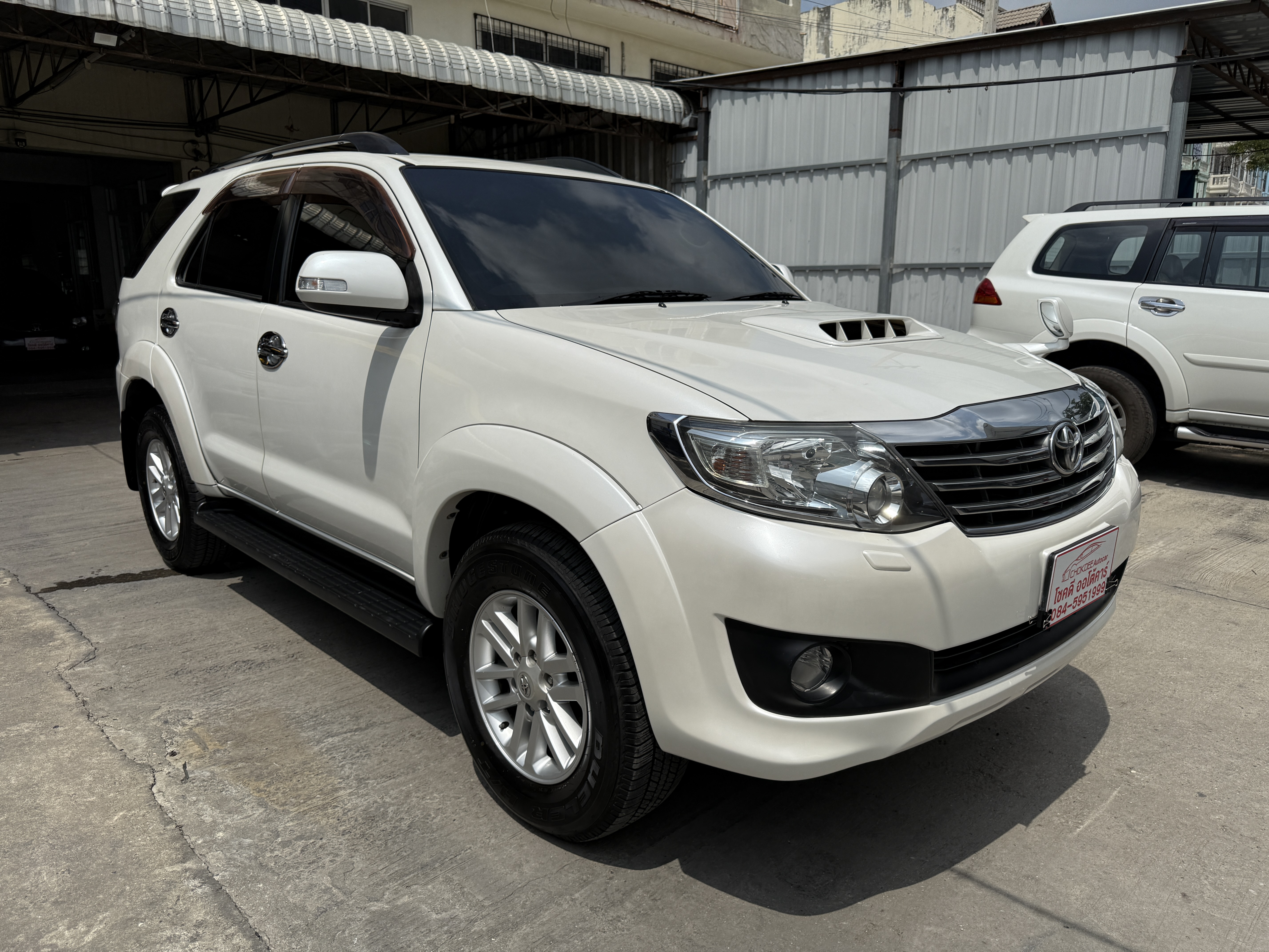 Toyota Fortuner Champ 3.0 V Navi 4WD At 2013 ขาวมุก