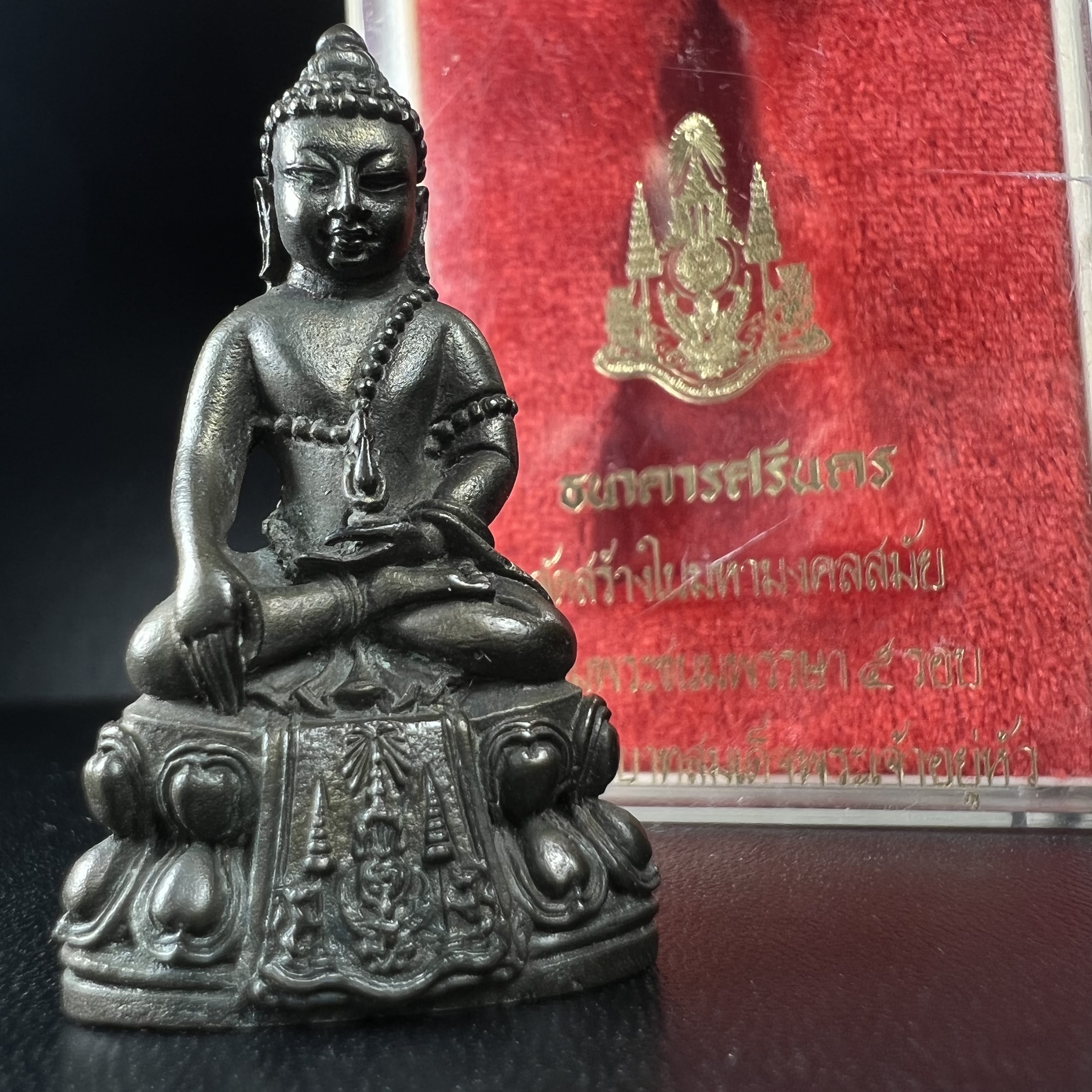 พระกริ่งปรมาภรณ์พุทธปัญญา(พระกริ่งศรีนคร 2) จัดสร้างเนื่องในมหามงคลสมัยเฉลิมพระชมน์พรรษา 5 รอบ องค์พระบาทสมเด็จพระเจ้าอยู่หัวรัชกาลที่9 ปี 2530 เนื้อนวโลหะ (ออกแบบโดยนายช่างเกษม มงคลเจริญ มีพระอาจารย์ไสว วัดราชนัดดา กรุงเทพ เป็นเจ้าพิธีครั้งสุดท้าย)