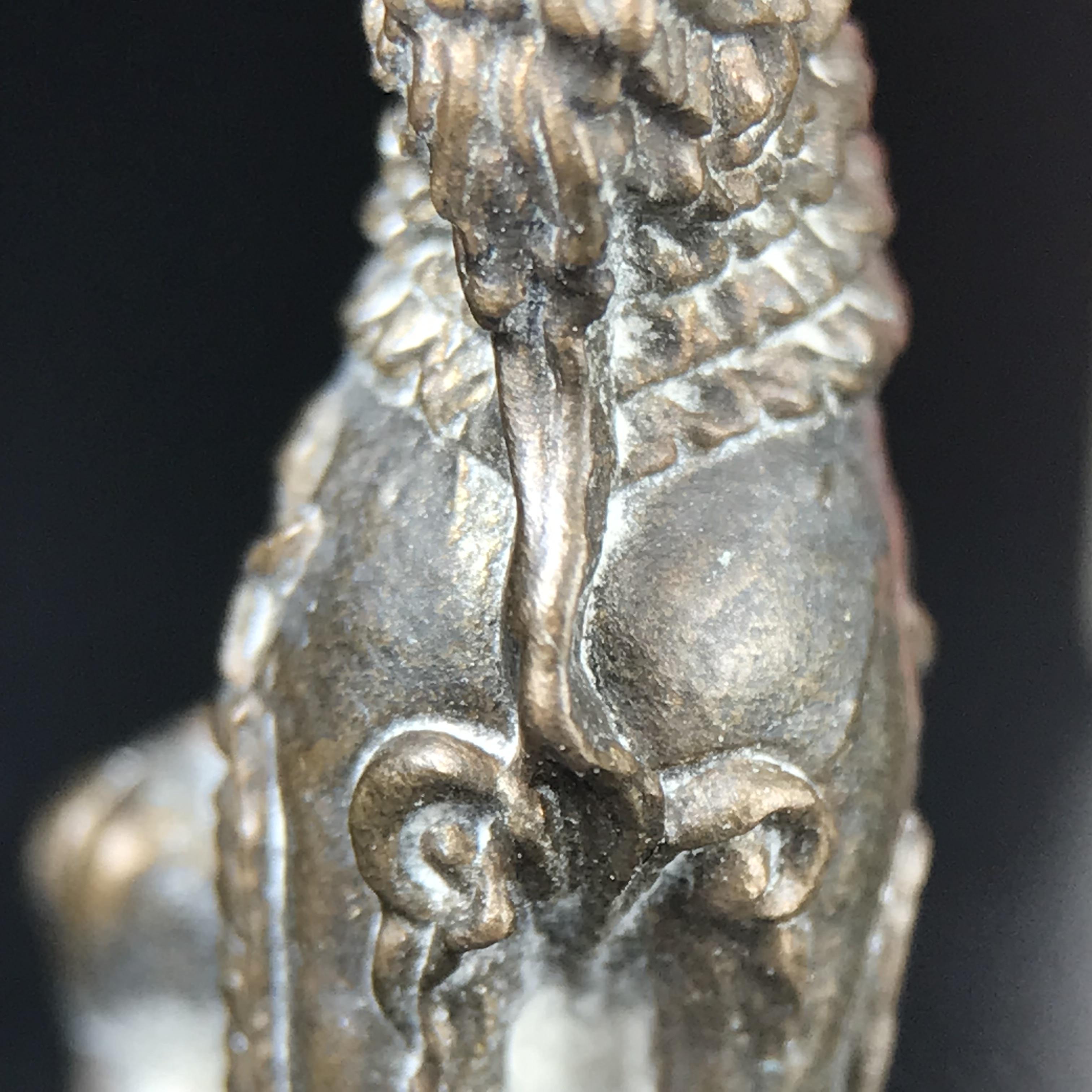 สิงห์เจ้าพ่อดำ วัดบุพพาราม จ.เชียงใหม่ ปี 2518 เนื้อนวโลหะ(ตอก 2 โค๊ต)หายาก(สภาพผิวเดิมสวยเดิมกล่องครบ) สิงห์รุ่นนี้มีพิธีดีมีเกจิอาจารย์ที่ร่วมปลุกเสกมากมาย****เครื่องราง ที่พระบาทสมเด็จพระเจ้าอยุ่รัชกาลที่ ๙ ทรงเสด็จฯประกอบพิธีด้วยพระองค์เอง