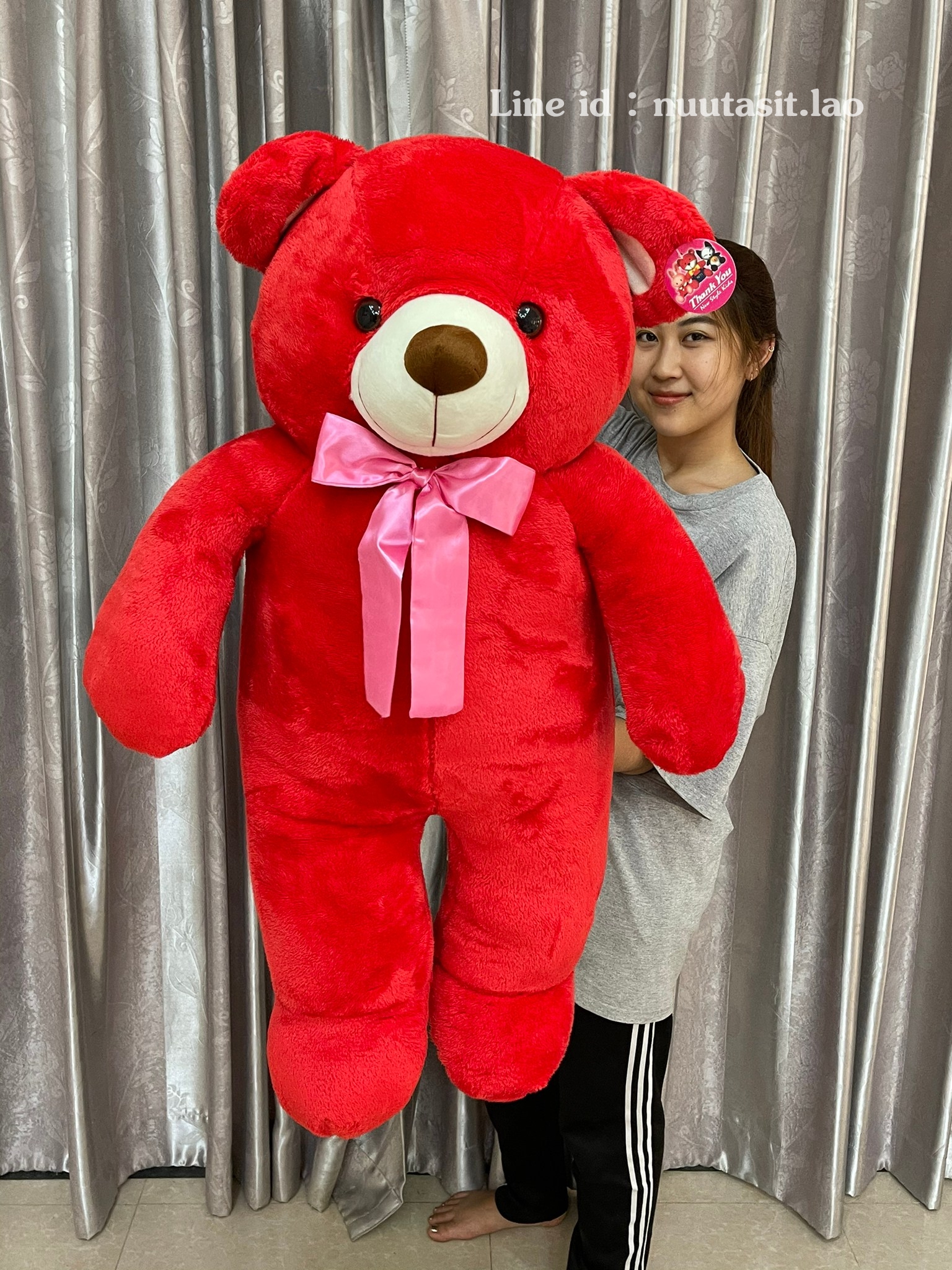 ตุ๊กตาหมีมีโบว์ตัวใหญ่