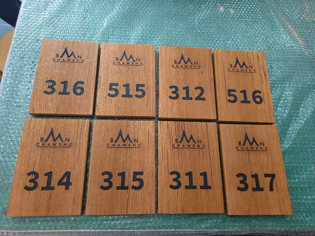 ป้ายไม้เลเซอร์