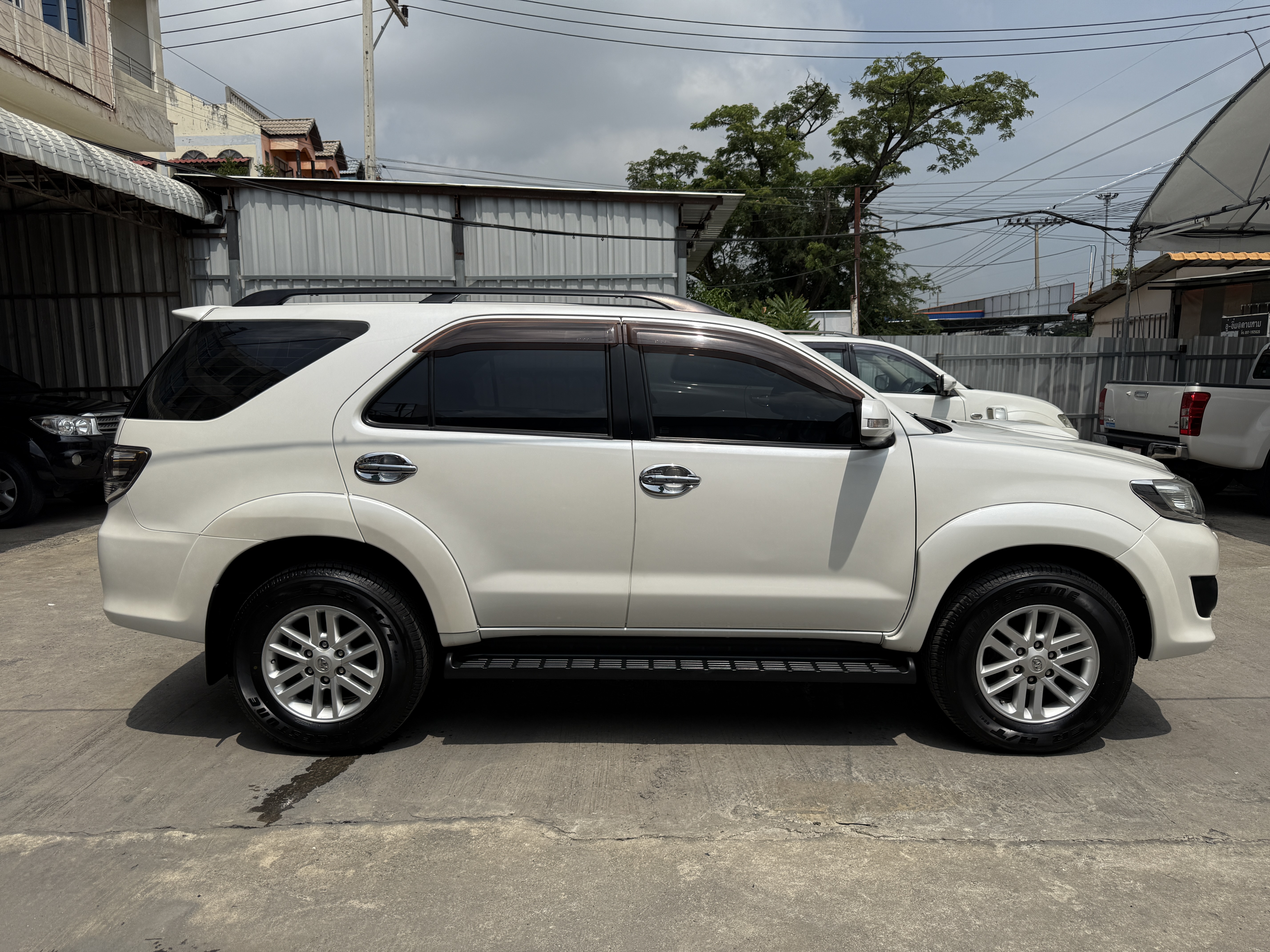 Toyota Fortuner Champ 3.0 V Navi 4WD At 2013 ขาวมุก