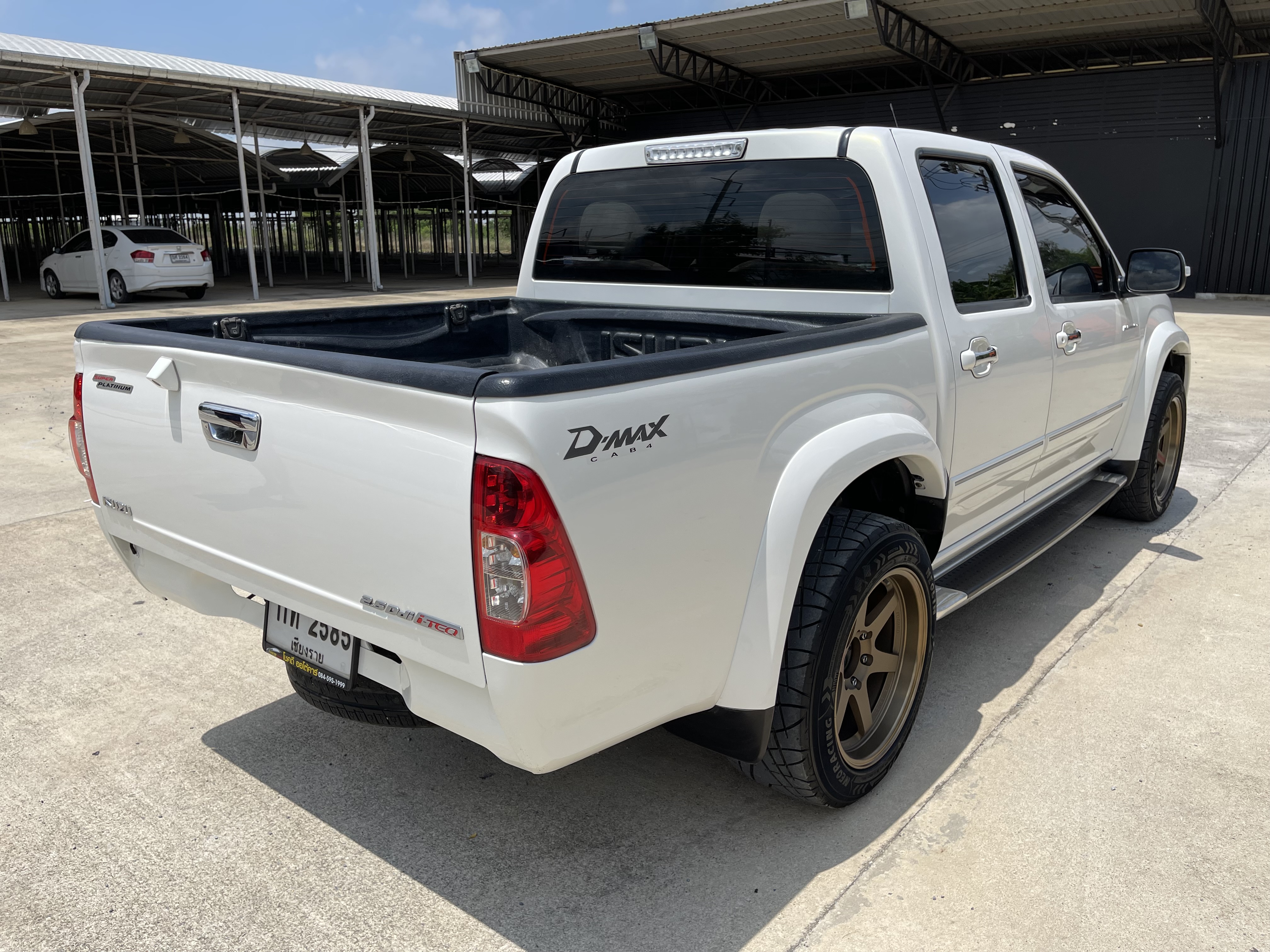 Isuzu Dmax 4ประตู Hilander 2.5 Abs Navi 2010 ขาวมุก