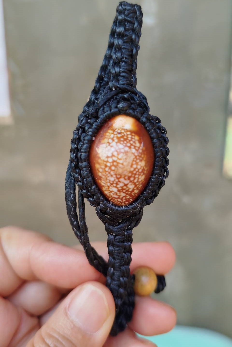 สร้อยข้อมือเบี้ยแก้ ถักเชือกเทียนสีดำ (ถักเชือกเทียนทั้งเส้น) ขนาด17-19 ซม