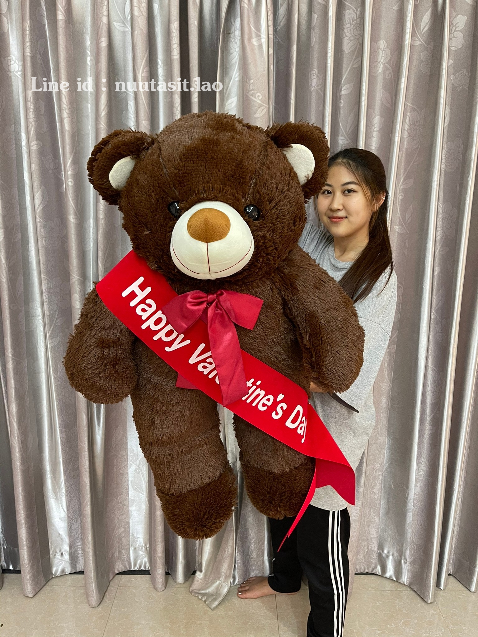 ตุ๊กตาหมีมีโบว์ตัวใหญ่