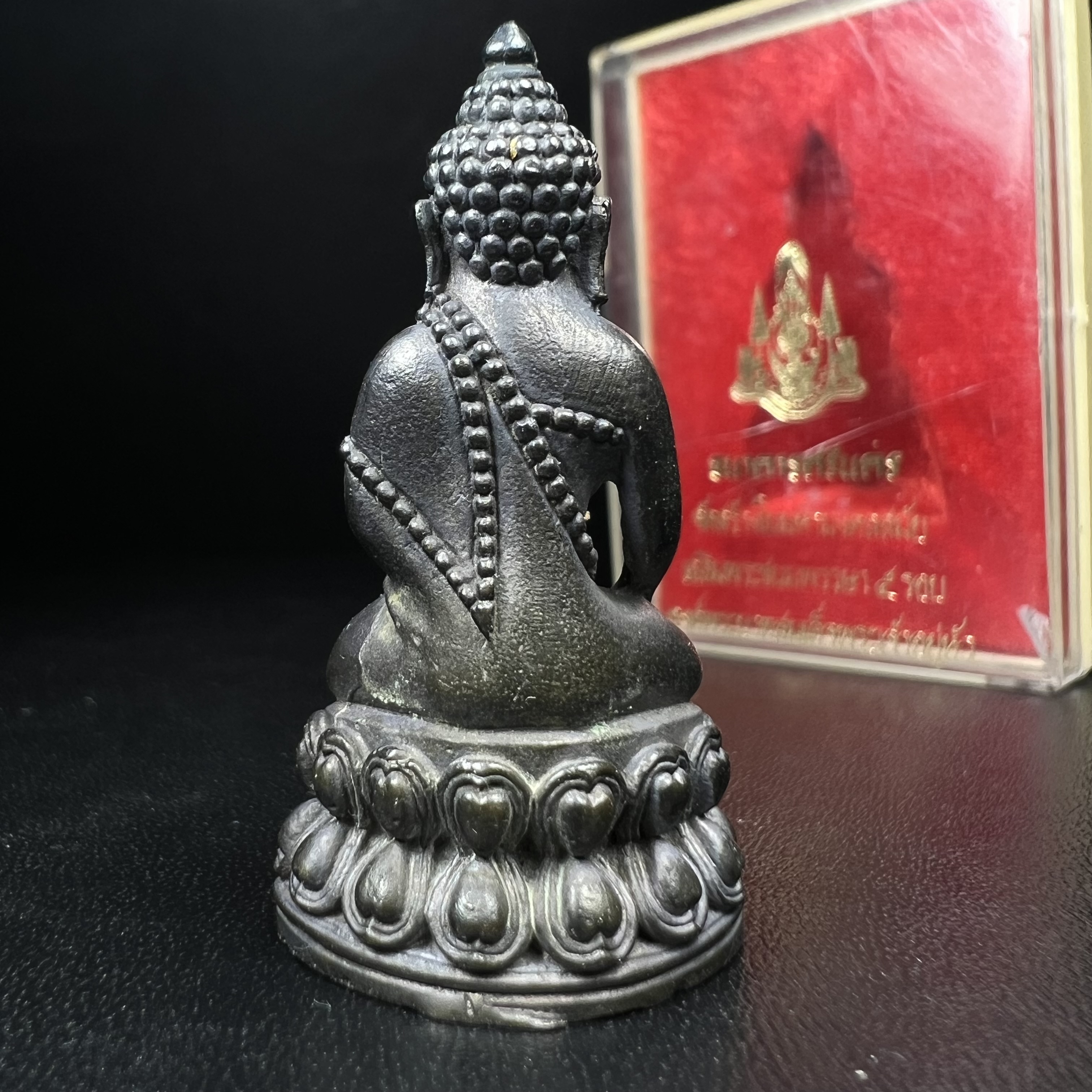 พระกริ่งปรมาภรณ์พุทธปัญญา(พระกริ่งศรีนคร 2) จัดสร้างเนื่องในมหามงคลสมัยเฉลิมพระชมน์พรรษา 5 รอบ องค์พระบาทสมเด็จพระเจ้าอยู่หัวรัชกาลที่9 ปี 2530 เนื้อนวโลหะ (ออกแบบโดยนายช่างเกษม มงคลเจริญ มีพระอาจารย์ไสว วัดราชนัดดา กรุงเทพ เป็นเจ้าพิธีครั้งสุดท้าย)