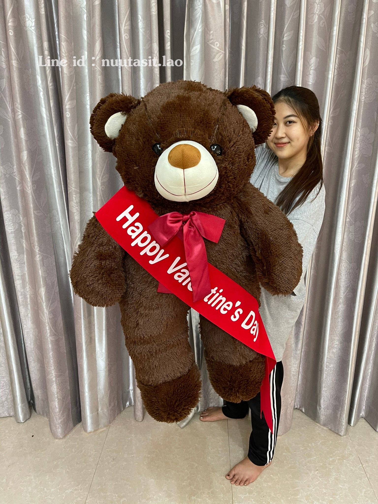 ตุ๊กตาหมีมีโบว์ตัวใหญ่