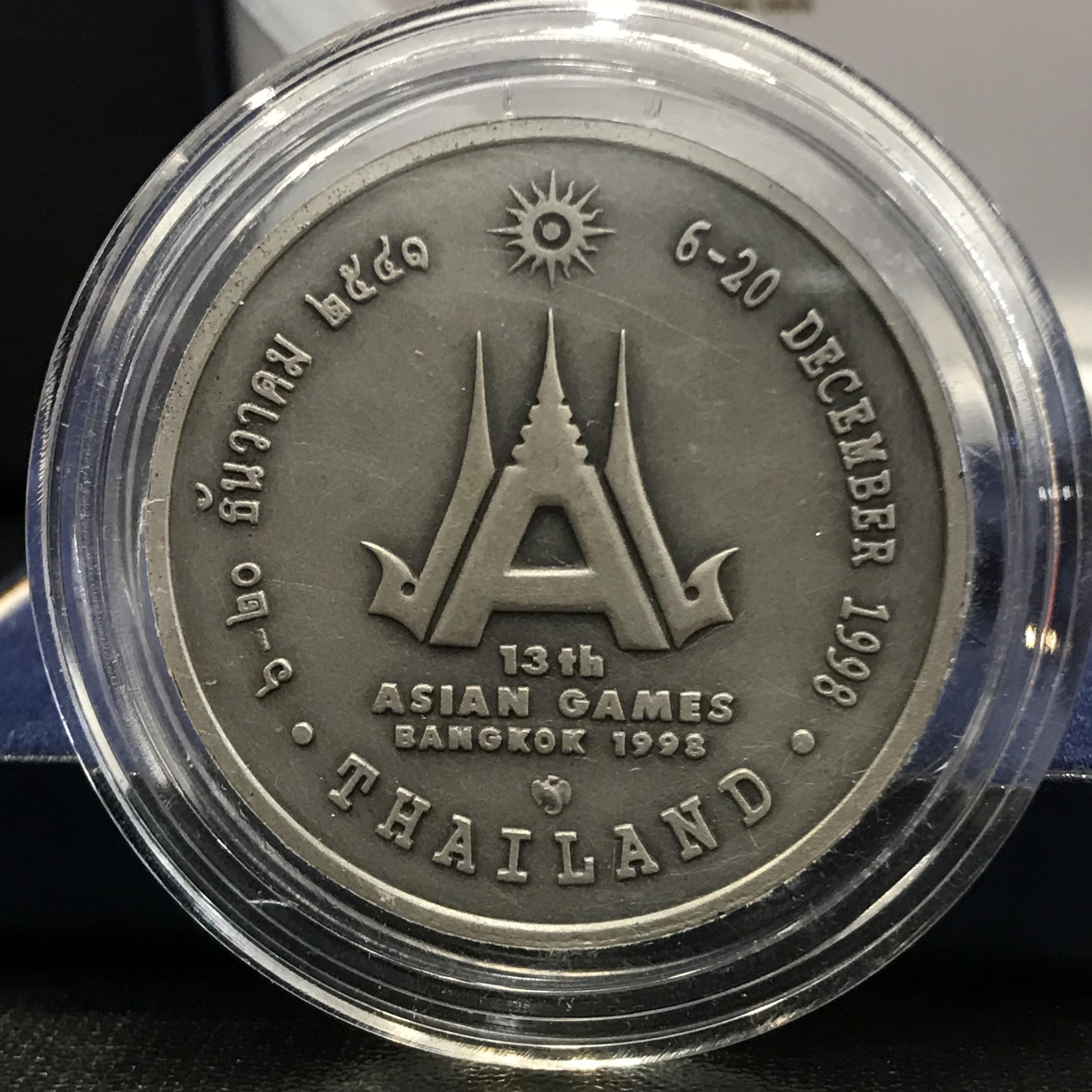 เหรียญที่ระลึกการแข่งขันกีฬาเอเชี่ยนเกมส์ ครั้งที่ 13 (ทรงเรือใบ “ไมโครมด”) เนื้อเงิน