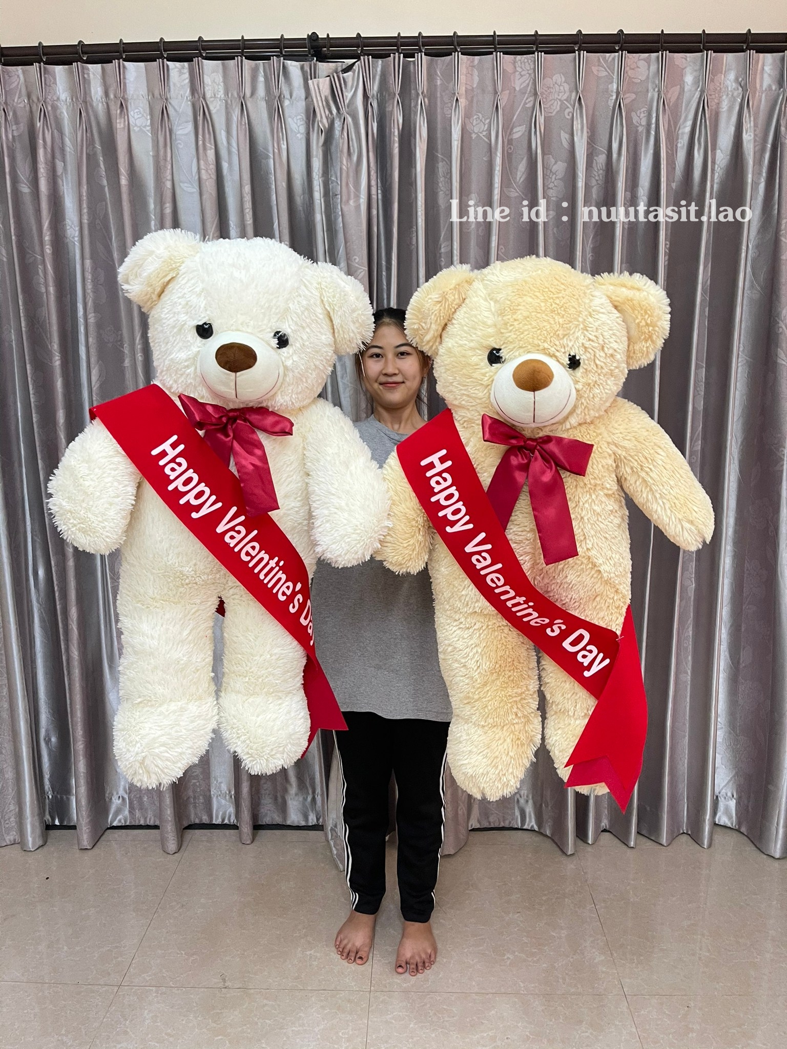 ตุ๊กตาหมีมีโบว์ตัวใหญ่