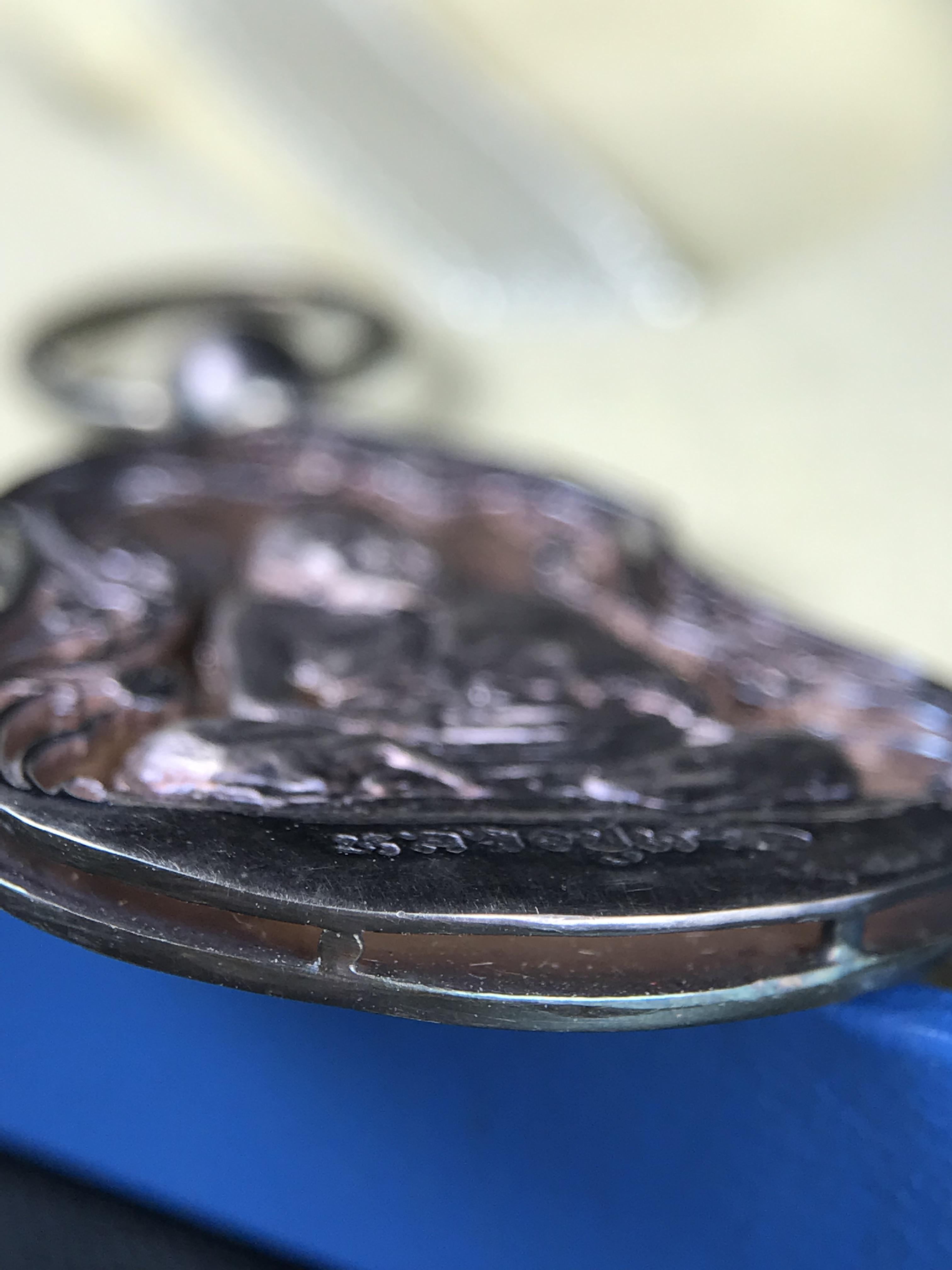 เหรียญหลวงปู่ทวด พระนามาภิไธย สก. แบบงานฉลุโบราณ(HAND MADE) ปี 2544 เนื้อเงิน(ผิวเดิมขึ้นสีรุ้งออกม่วงธรรมชาติสวยมาก) พิธีปลุกเสก ณ อุโบสถวัดช้างให้ และ พิธีมังคลาภิเษก ณ พระอุโบสถ วัดพระศรีรัตนศาสดาราม(วัดพระแก้ว) (1 ใน 2000 เหรียญ)พบเจอน้อยหายากมาก