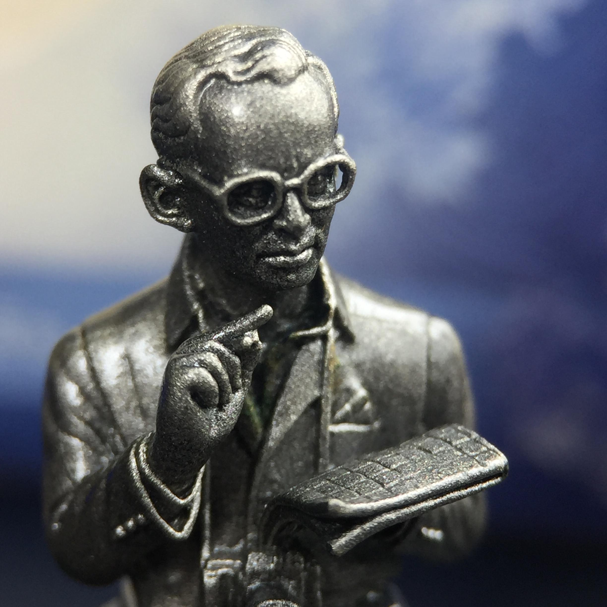 พระบรมรูปพระบาทสมเด็จพระเจ้าอยู่หัวรัชกาลที่ 9(ทรงงาน) ภปร. รุ่นเพราะแผ่นดินนี้คือแผ่นดินเกิด ปี 2551 ขนาดสูง 1 นิ้ว เนื้อบรอนซ์ชุบเงินรมดำ(ด้านหน้า ฐานพระบรมรูปฯ ประดิษฐานอักษรพระปรมาภิไธย ภ.ป.ร.)นิยมหายาก