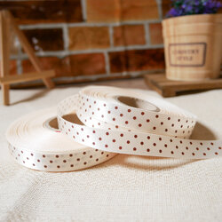 ริบบิ้นผ้าสีครีม พิมพ์ลายจุดสีน้ำตาล ขนาด 1.2 cm.