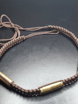 ของป้องกัน ตะกรุด คาดเอวลูกปืน สีน้ำตาล ตะกรุด รัดเอว ตะกรุดลูกปืน ปลุกเสกแล้ว