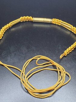 ของป้องกัน ตะกรุด คาดเอว ตะกรุดสีทอง ล้อมลูกปืน สีเหลือง ปลุกเสกแล้ว