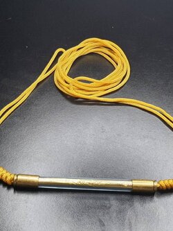 ของป้องกัน ตะกรุด คาดเอว ล้อมยันต์ลูกปืนข้าง สีเหลือง ปลุกเสกแล้ว