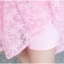 ชุดเดรสสั้นผ้าลูกไม้สีชมพูสดใส แขนกุด กระโปรงหน้าสั้นหลังยาว