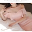 ชุดเดรสสั้นผ้าโพลีเอสเตอร์สีชมพูอมส้มเข้ารูป โชว์ไหล่ แขนระบาย สวยเรียบหรูดูดี มีสไตล์