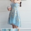 ชุดเดรสสั้นผ้าโปร่งสีฟ้าอ่อน ปักลายดอกไม้สีเหลืองอ่อน สวยหรู