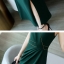 ชุดเดรสยาวผ้ายืดออกงานสีเขียวเข้ม ทรงตรง คอวี แขนกุด กระโปรงผ้าป้าย สวยหรู ดูดี
